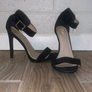 Black and gold stilettos